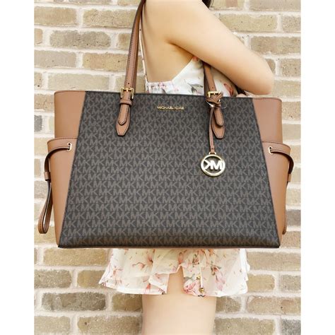 how much does michael kors purse cost|mk purse price.